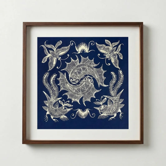 Framed Miao batik artwork with a blue and white abstract design on a white wall