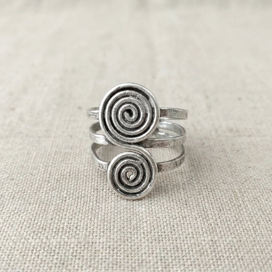 Miao Silver Double Disc Spiral Ring on a light background