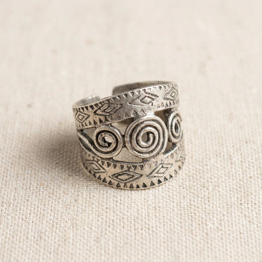 Miao Silver Engraved Spiral Band Ring on a light background