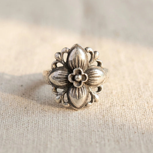 Miao Silver Floral Adjustable Ring on a light background