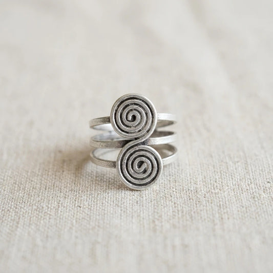 Miao Silver Linked Spiral Disc Ring on a light background