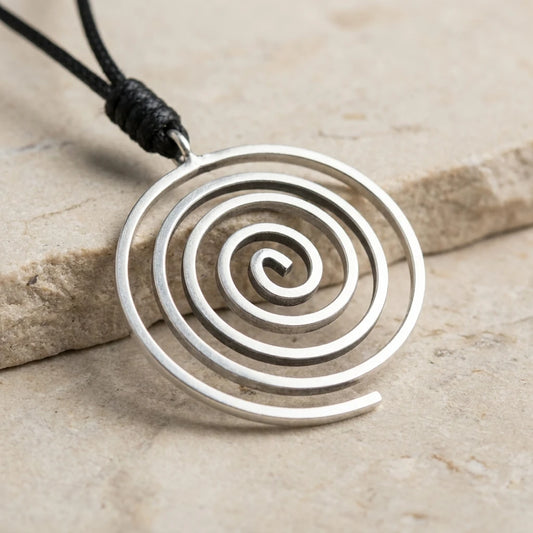 Miao Silver Spiral Pendant Necklace on a light background