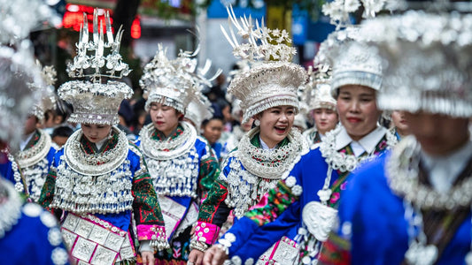 Miao people in traditional dress during a cultural gathering