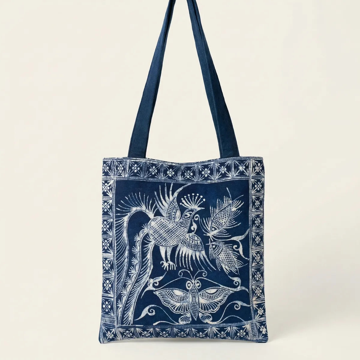 Miao batik Tote bag with blue and white design on a beige background