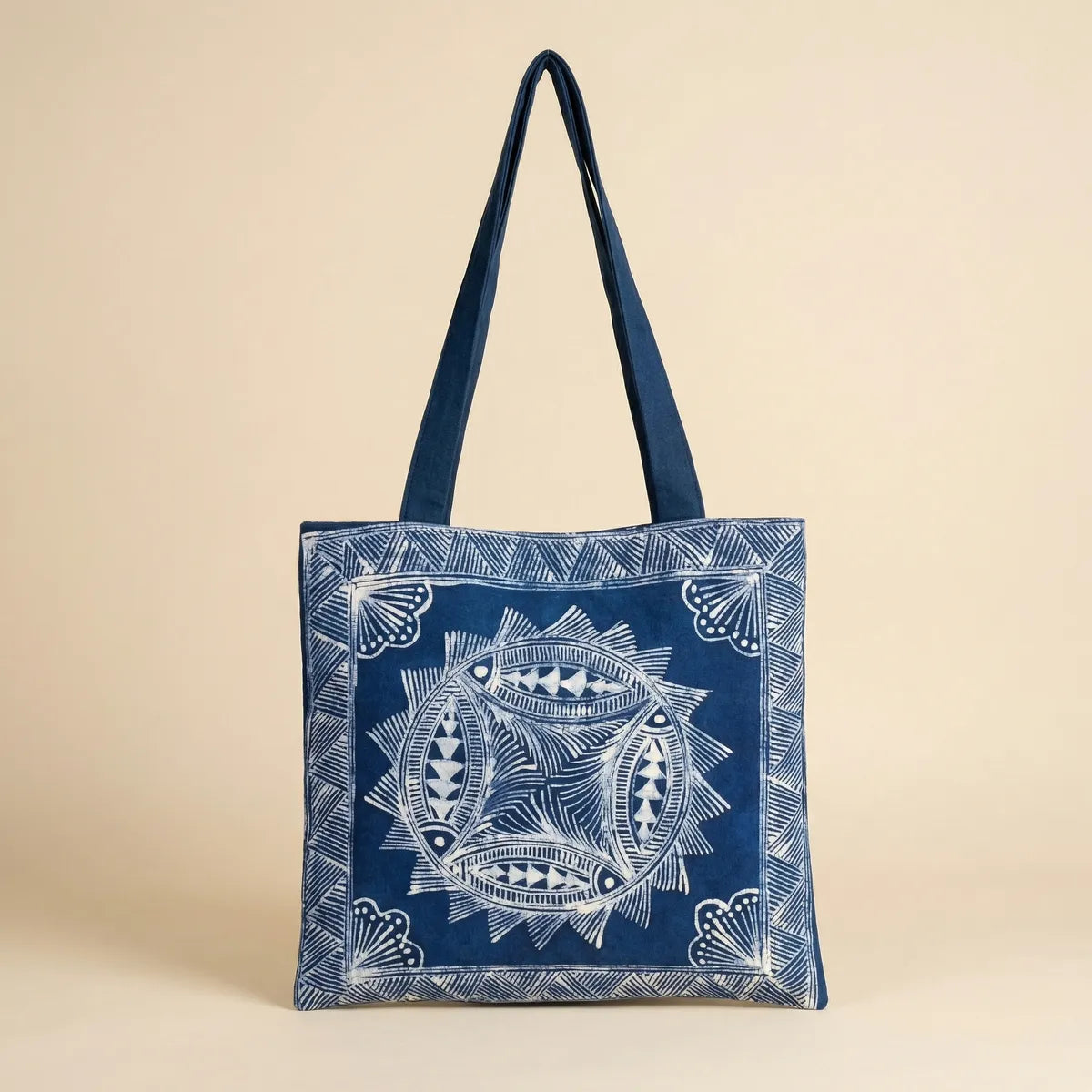 Miao batik tote bag with white geometric pattern on a beige background