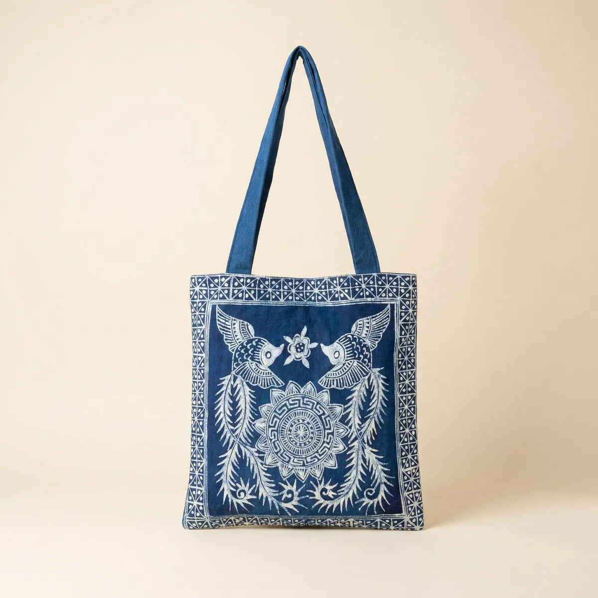 Miao batik tote bag with white pattern on a beige background