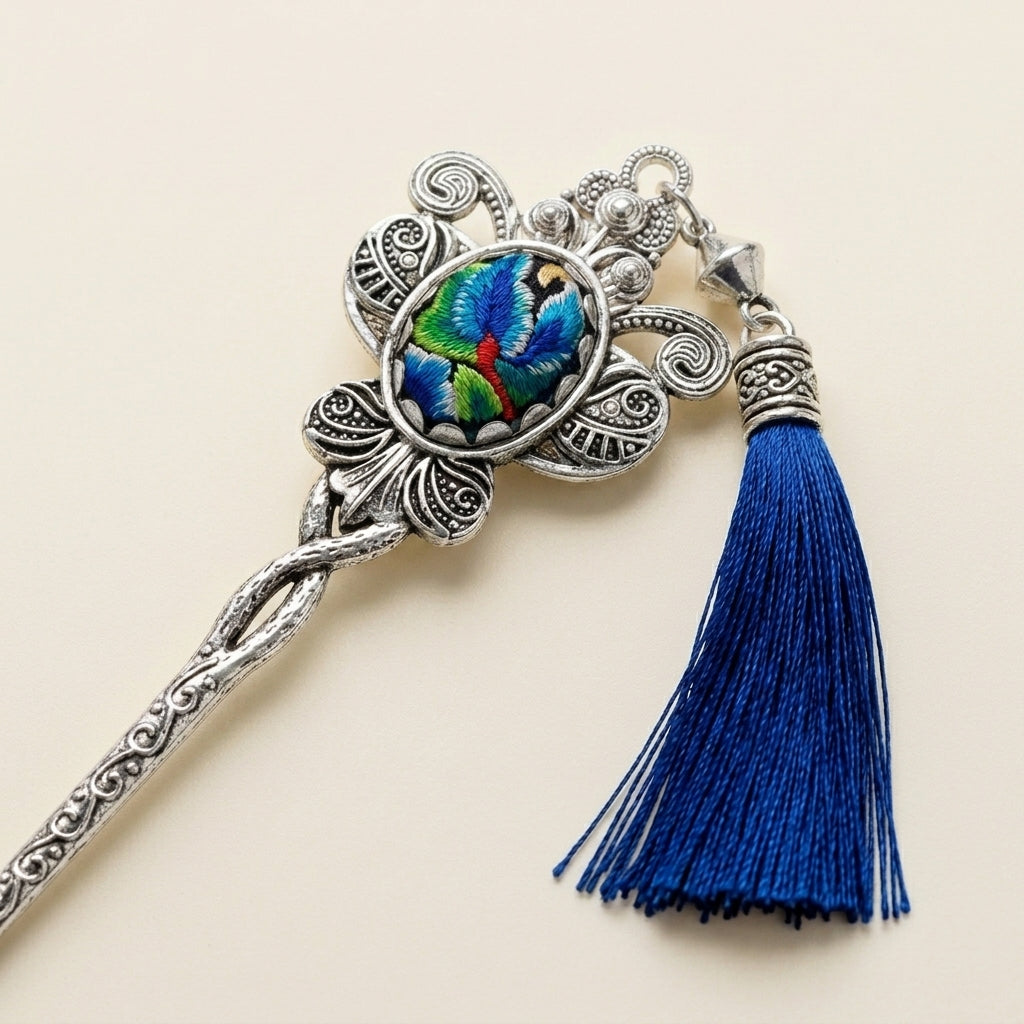 Miao silver embroidery hair stick with a blue tassel
