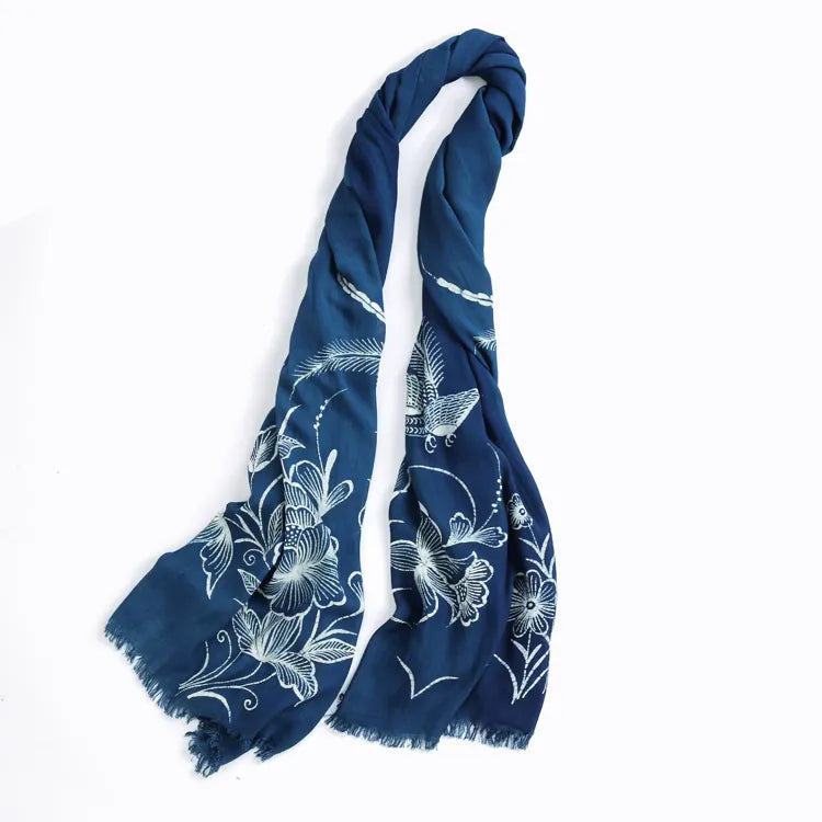 Navy blue Miao batik scarf with white floral patterns on a white background