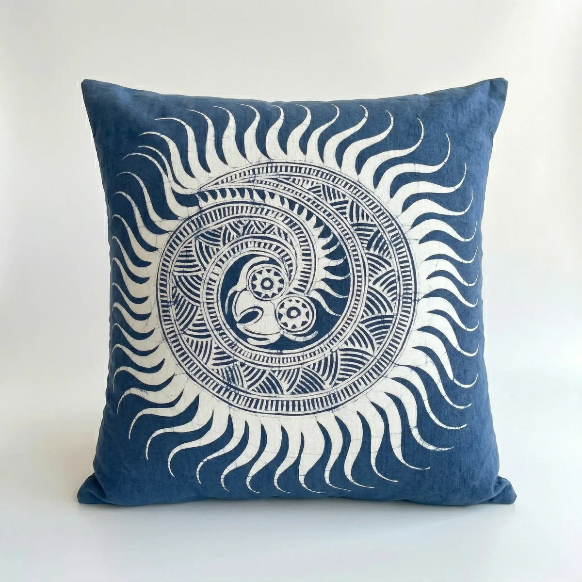 Miao batik  pillow with white decorative pattern on a white background