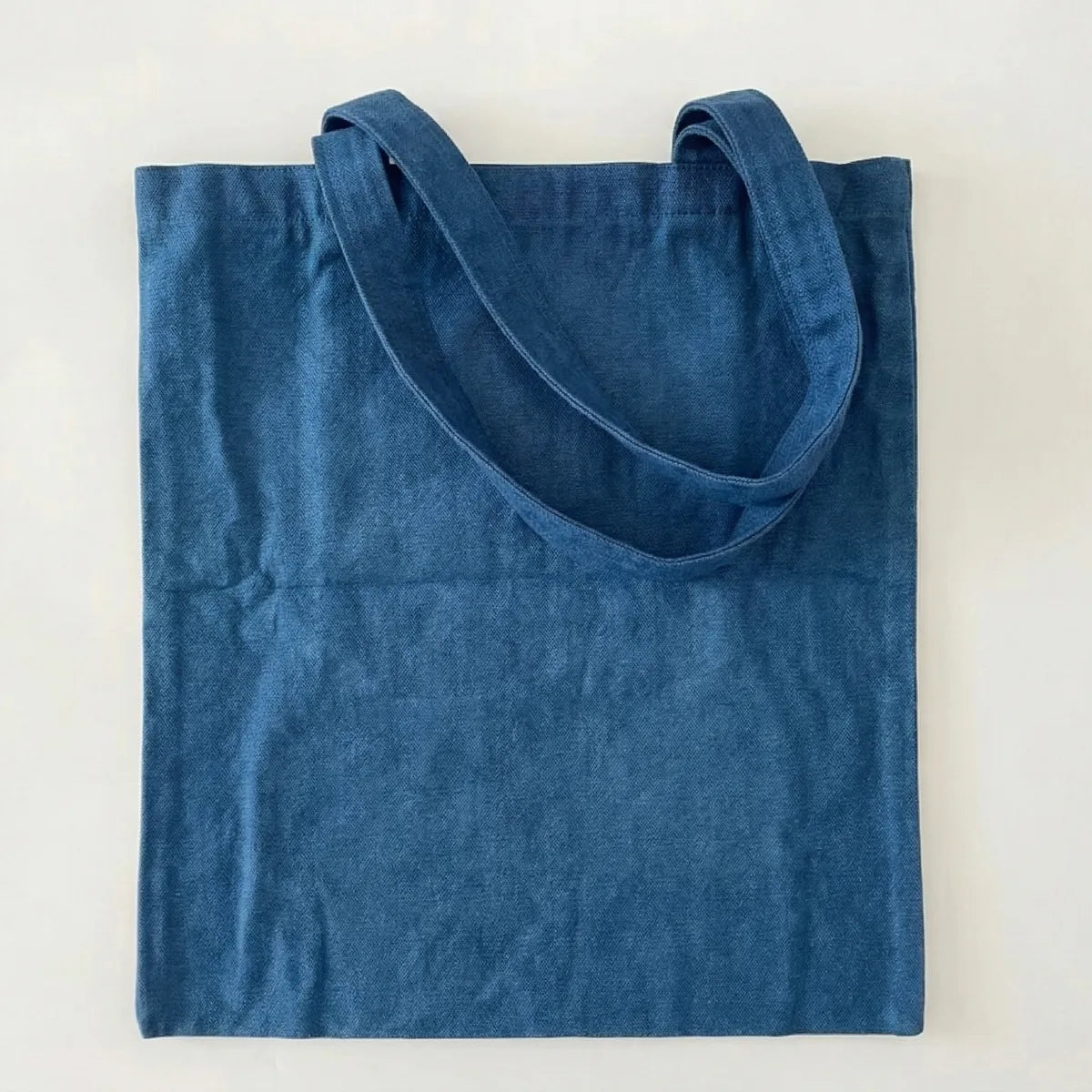 Miao batik  tote bag on a white background