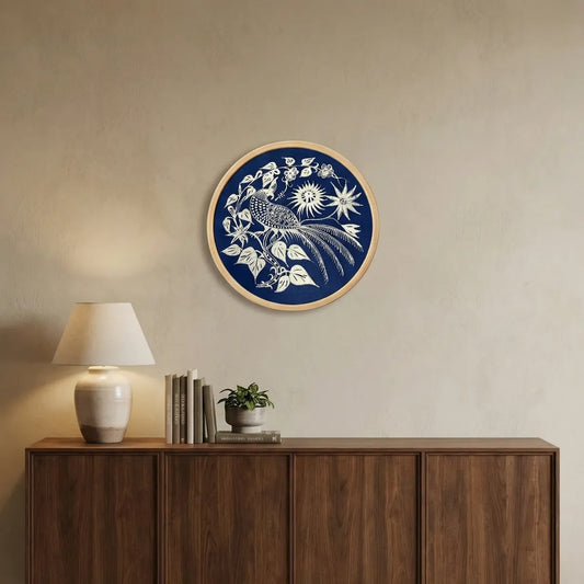 Miao batik wall art with floral and bird design on a beige wall above a wooden cabinet.