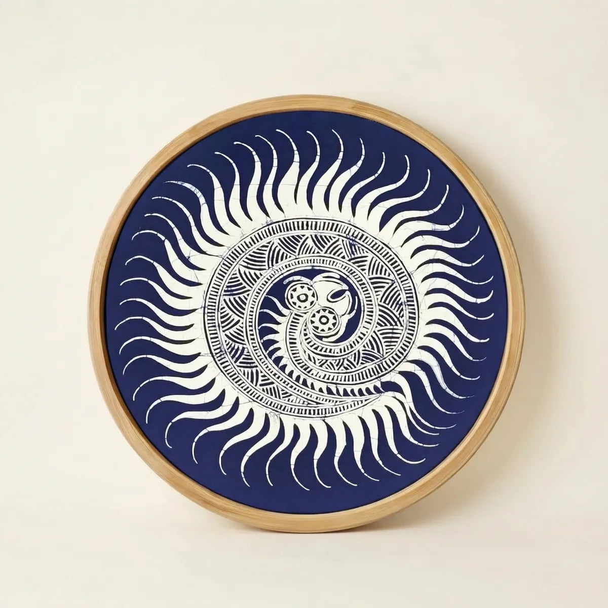 Miao batik Wall hanging with white sun-like design on a blue background, framed in wood.