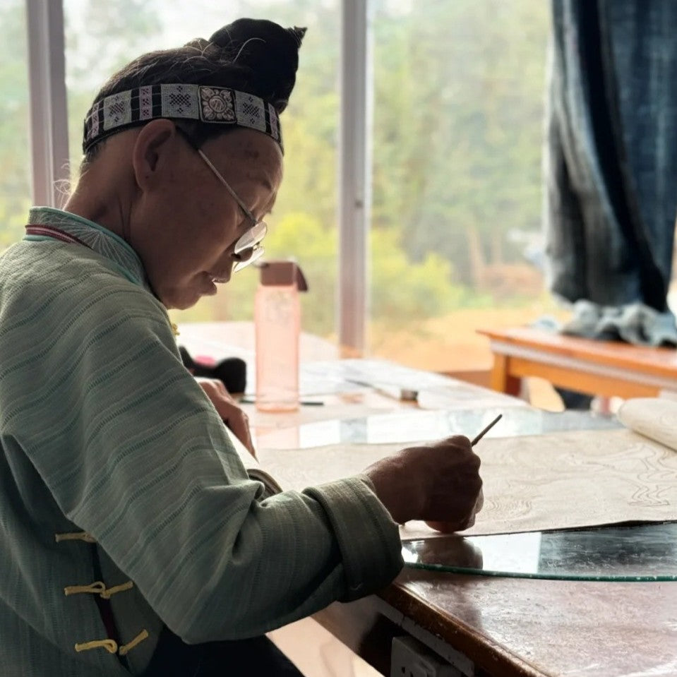 Miao batik textile displayed as handmade indigo art