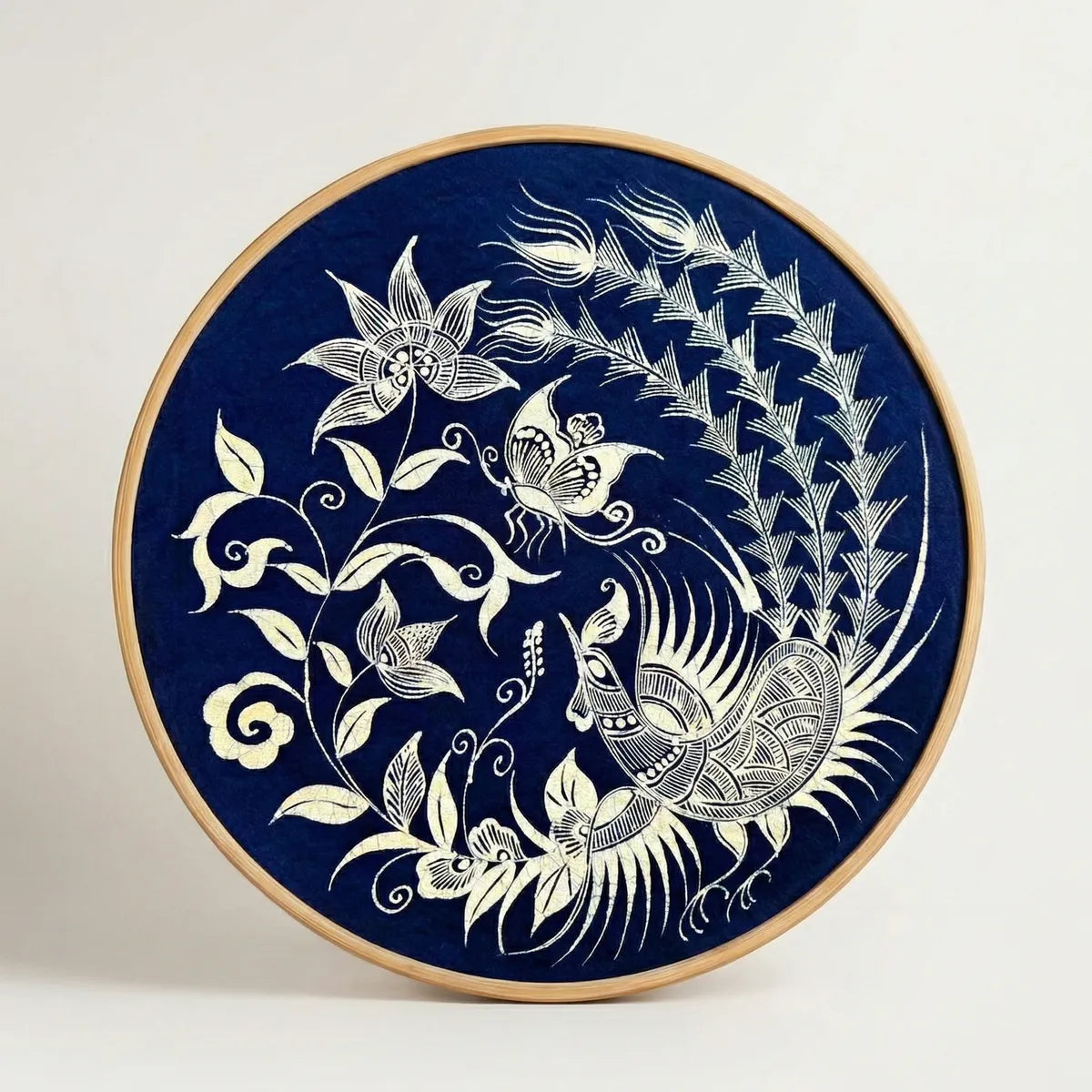 Decorative Miao batik wall art with white floral and butterfly design on a blue background