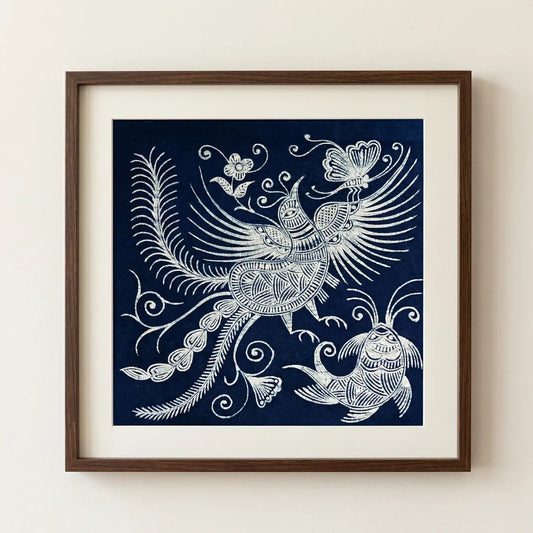 Framed Miaozu Batik artwork with a stylized bird and turtle design on a blue background