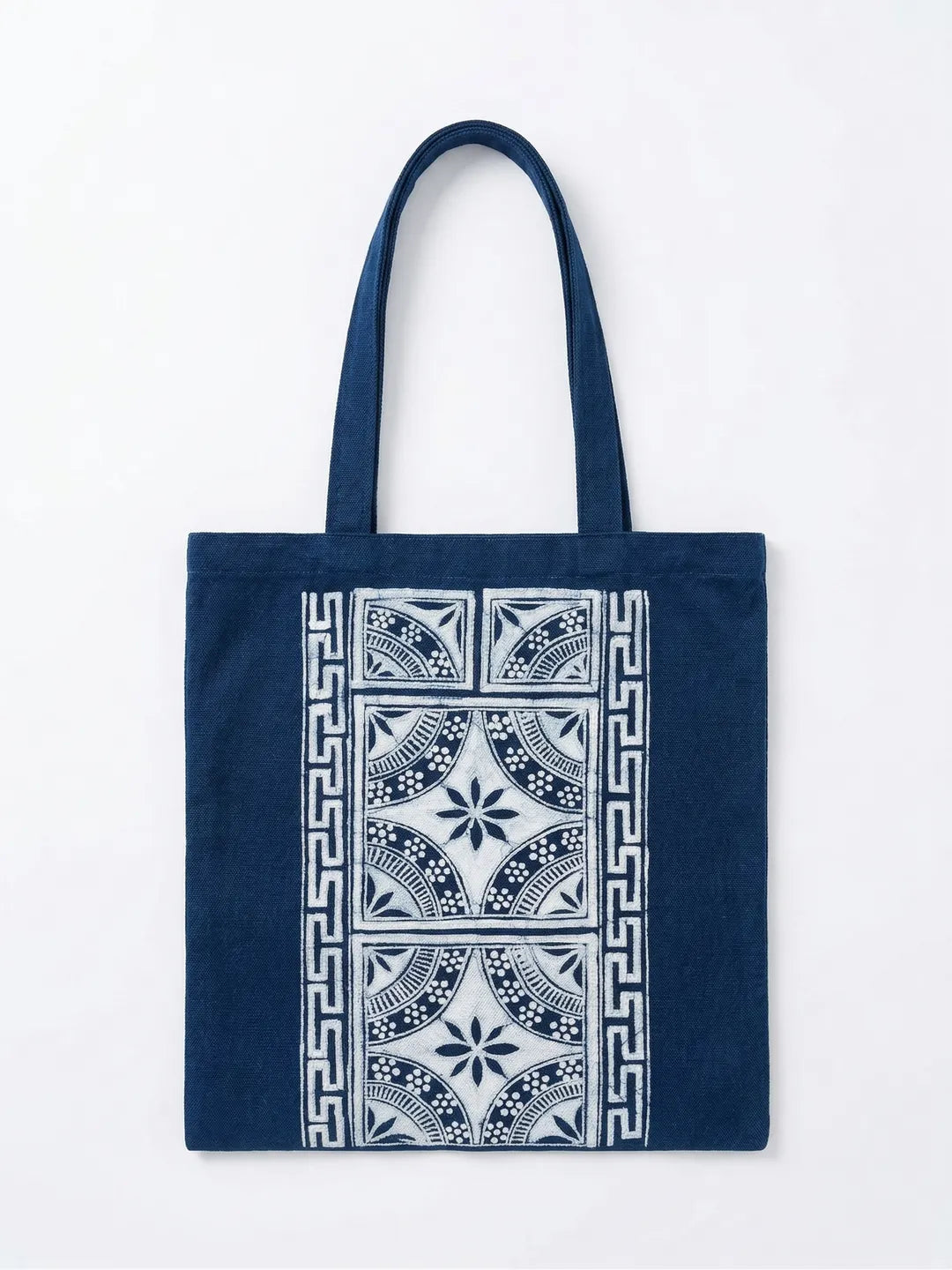 Miao batik blue tote bag with white geometric pattern on a white background