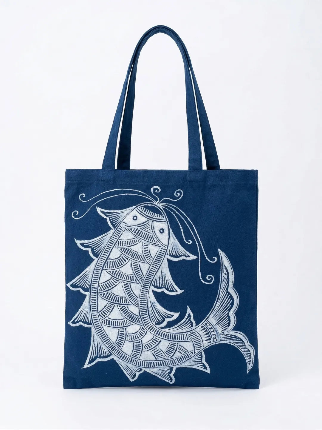 Miao batik tote bag with a white fish design on a white background
