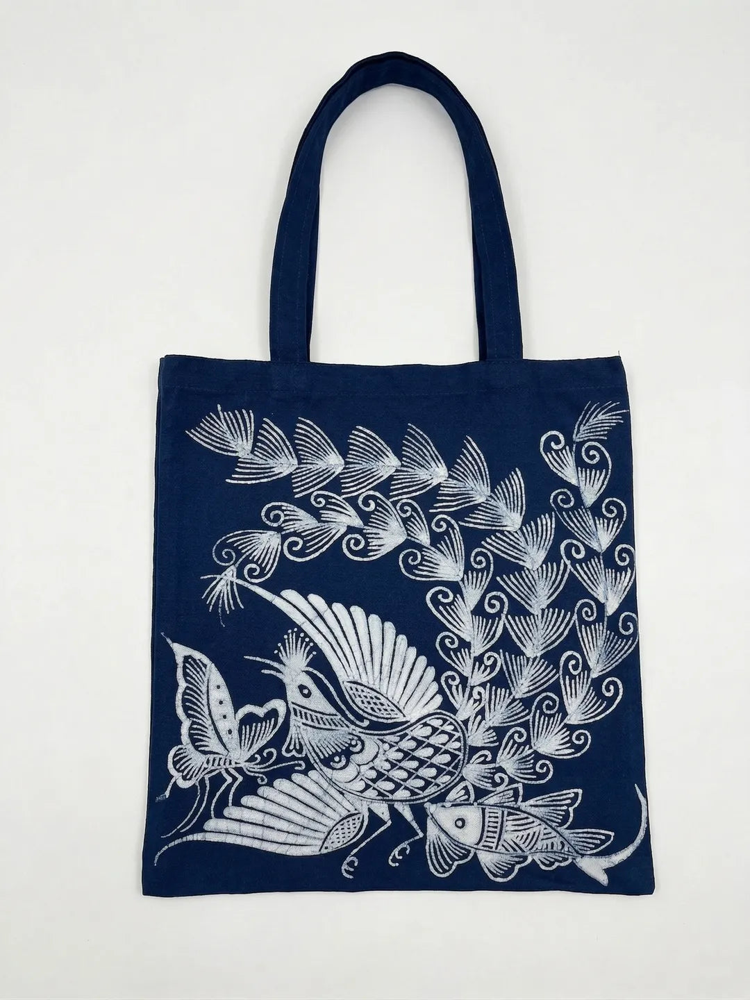 Miaozu Batik bag with white fish and shell pattern on a white background