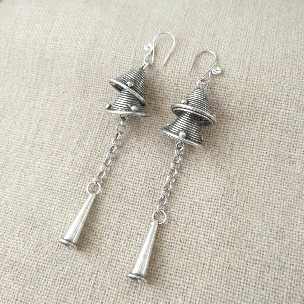 Miao Silver Double Bell Dangle Earrings – Long Tassel Bell on a light background