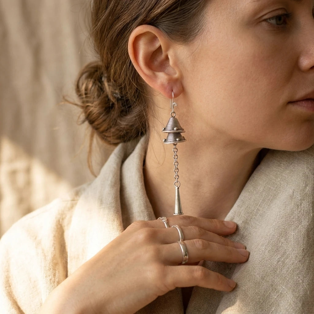 Miao Silver Double Bell Dangle Earrings – Long Tassel Bell worn for scale