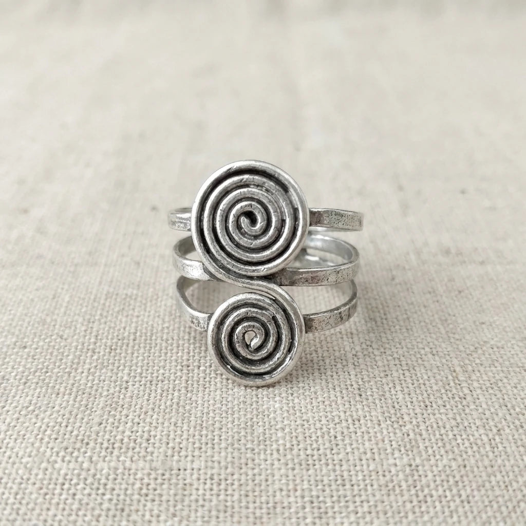 Miao Silver Double Disc Spiral Ring on a light background