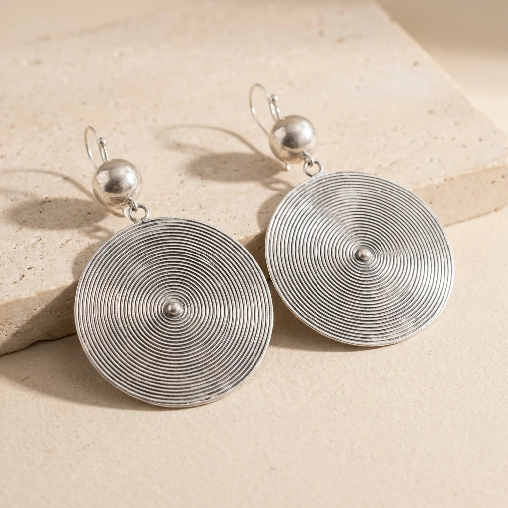 Miao Silver Round Disc Earrings – Large Disc on a light background